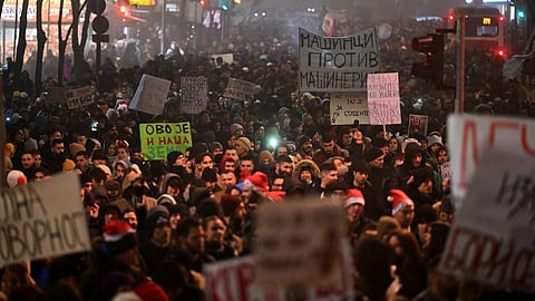 Students and citizens hold placards as they attend a protest on New Year's Eve to demand accountability for the November train station roof collapse that killed 15 people in Belgrade, Serbia, on December 31, 2024.