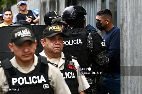 One man of the military personnel who are being investigated for the alleged forced disappearance of four minors who went missing during a military operation, leaves the courthouse to be transferred to the Litoral Penitentiary complex in Guayaquil, Ecuador, on December 31, 2024. A criminal court in Ecuador ordered on Tuesday the remand in custody of 16 military personnel who are being investigated for the alleged forced disappearance of four teenagers, which has generated commotion in the country and concern among international organizations, informed the Attorney General's Office.
