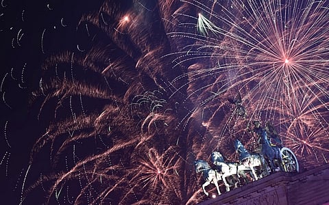 Fireworks illuminate the Quadriga atop the Brandenburg Gate during the New Year celebrations in Berlin on 1 January, 2025.