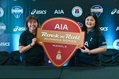 Princess Galura (left), general manager of The IRONMAN Group Philippines, and AIA Philippines chief marketing officer Melissa Henson seal the AIA’s sponsorship of the Rock ‘n’ Roll Running Series Manila 2025 during the official contract signing ceremony recently.