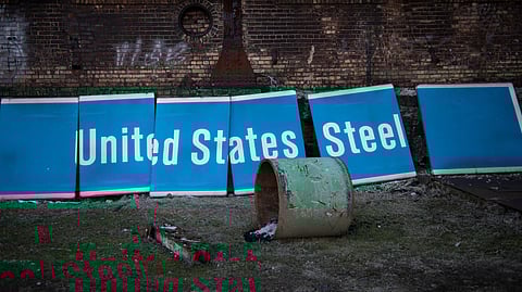 (FILES) A US Steel sign is seen outside the Carrie Furnace which was once part of the abandoned Homestead Steel Works that continues to be further converted for public use after being designated as a historical landmark in Swissvale, Pennsylvania. US President Joe Biden on 3 January 2025, announced he has blocked the controversial $14.9 billion sale of US Steel to Japan's Nippon Steel, citing a strategic need to protect domestic industry.