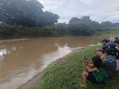 Laborer missing after swimming in flooded CDO River