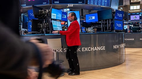 NEW YORK, NEW YORK - DECEMBER 31: Traders work on the floor of the New York Stock Exchange (NYSE) on the last day of trading for the year on December 31, 2024 in New York City. Stocks were up slightly in morning trading following a disappointing last few weeks of the year, which saw significant drops in the market value.