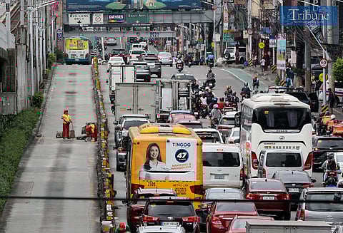 (January 13 2025) Workers clean the debris after a motorist in a pick-up rammed two concrete barriers in an accident along the northbound lane of edsa in quezon city on monday, january 13, 2025. BHW party-list Rep. Angelica Natasha Co said over the weekend that 35 people died per day, or 12,690 died yearly, due to road crash incidents in the country as reported by the UNICEF Philippines. Photo/Analy Labor
