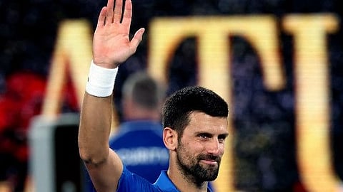 Serbia's Novak Djokovic celebrates his victory against USA's Nishesh Basavareddy during their men's singles match on day two of the Australian Open tennis tournament in Melbourne on 13 January 2025.