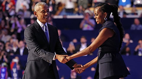 US First Lady Michelle Obama speaks at a campaign rally in Kalamazoo, Michigan, on 26 October 2024 for US Vice President and Democratic presidential candidate Kamala Harris.