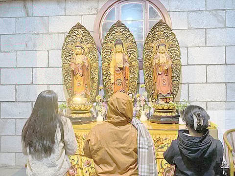 The writer paused at the hall dedicated to prayer and offered a heartfelt wish for abundance.