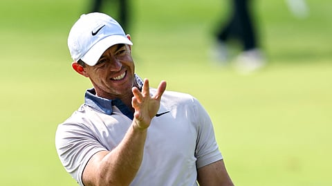 Rory McIlroy gets frustrated after falling nine shots behind leader Ewen Ferguson in the Dubai Desert Classic in the United Arab Emirates.