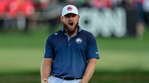 TYRELL Hatton celebrates after putting on the 18th green en route to winning the Dubai Desert Classic. 