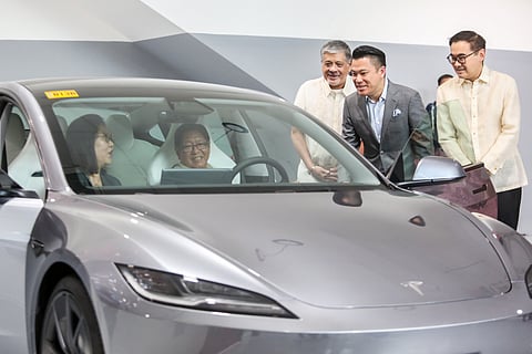 Tesla Asia Pacific Regional Director Isabel Fan shows off the features of Tesla Model 3 to President Ferdinand "Bongbong" Marcos Jr. during the launching of Tesla Center Philippines in Uptown Bonifacio, Taguig City on Monday, 20 January 2025. 

Also present are Special Assistant to the President for Investment and Economic Affairs Frederick Go, Special Assistant to the President Antonio Lagdameo Jr., Alliance Global Group Inc. President and CEO Kevin Tan, and Taguig Mayor Lani Cayetano. 