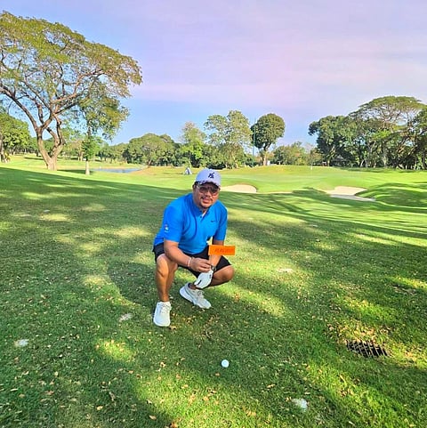 Arbie Jacinto leads the way alongside guest partner Ramil Gutierrez in the 37th Mango Tee on Saturday at the Alabang Country Club in Muntinlupa.