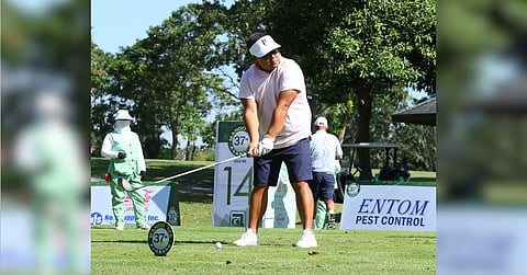Justin Tambunting makes his move Sunday in the 37th Mango Tee at the Alabang Country Club. 