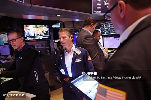 [FILE PHOTO] Traders work on the floor of the New York Stock Exchange during morning trading on January 28, 2025 in New York City. Stock opened up flat amid the arrival of the Chinese artificial intelligence startup DeepSeek which sparked a sell-off in tech stocks.