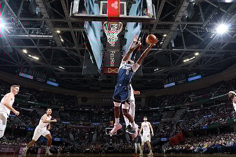 Olivier Maxence-Prosper #8 of the Dallas Mavericks shoots the ball during the gameagainst the Cleveland Cavaliers on February 2, 2025 at Rocket Mortgage FieldHouse in Cleveland, Ohio. 