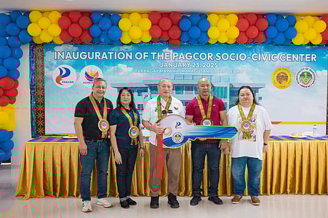 Safe shelters mushroom Ramon Stephen Villaflor, Philippine Amusement Gaming Corp.’s VP for Corporate Social Responsibility Group (third from left) hands the symbolic key of the newly built socio-civic center to Maragusan Mayor Angelito Cabalquinto (second from right). Pagcor recently inaugurated two socio-civic centers in the mountainside towns of Maragusan and New Bataan that are frequently hit by natural disasters. The new facilities, built with P50 million funding each from Pagcor, will serve as safe shelters during emergencies as well as venues for various socio-economic activities of the communities.