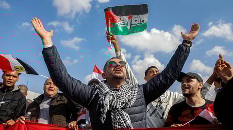 Demonstrators gather outside the Egyptian side of the Rafah border crossing with the Gaza Strip to protest against a plan floated by US President Donald Trump to move Palestinians from the Gaza Strip to Egypt and Jordan. Trump proposed a plan to "clean out" the Gaza Strip, and for Jordan and Egypt to take in Palestinians from the war-ravaged territory. Both states have strongly rejected the idea, but on 30 January Trump again insisted that "we do a lot for them, and they're going to do it".