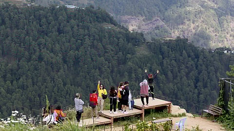 LOCAL tourists enjoy the view of the mountain in Atok, Benguet, one of the highest and coldest places in the Philippines. Temperature in Baguio City dipped to 14.6 degrees Celsius on Sunday as the northeast monsoon continues to affect the country. 