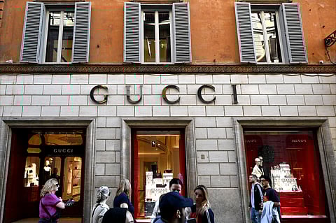[FILE PHOTO] A picture shows the Gucci logo on the front store at via dei Condotti in central Rome, on 11 November 2024.