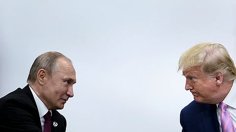 Russian leader Vladimir Putin (left) and then-President Trump during the G20 summit in Osaka, Japan, in 2019. Brendan Smialowsk