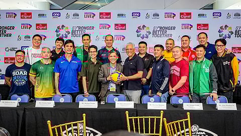 UAAP executive director Rebo Saguisag (middle) and representatives of all competing schools smile as the league’s Season 87 women’s volleyball tournament gets underway. 