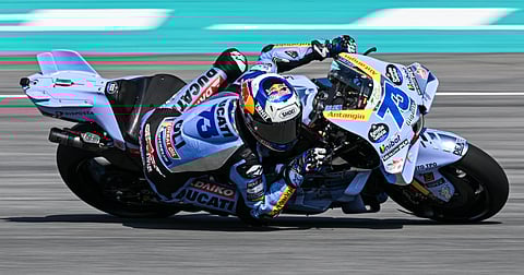 Alex Marquez takes a corner during the third day of the 2025 MotoGP pre-season testing at the Sepang International Circuit. 
