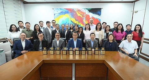 First row, from left: Vice President and Chief Corporate Social Responsibility Officer Jeffrey O. Tarayao, Senior Vice President and Chief Human Resources Officer Edgardo V. Carasig, First Vice President and Head of Networks Froilan J. Savet, Executive Vice President and Chief Operating Officer Ronnie L. Aperocho, Senior Vice President and Chief Revenue Officer Ferdinand O. Geluz, First Vice President and Head of Customer Retail Services Charina P. Padua, and Vice President and Head of Corporate Communications Joe R. Zaldarriaga.