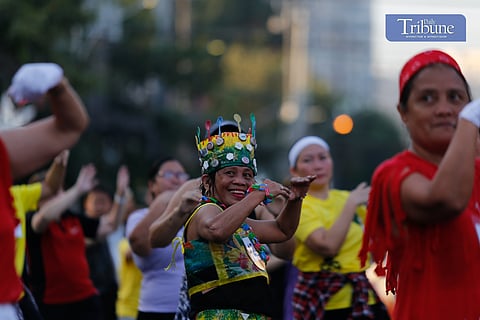 Nearby residents near Tomas Morato Avenue gather for a Zumba session on the morning of 16 February 2025 as part of the Quezon City government's "Car-free, carefree Sundays." The event that started late last year aims to promote outdoor activities, healthy living, and environmental sustainability.