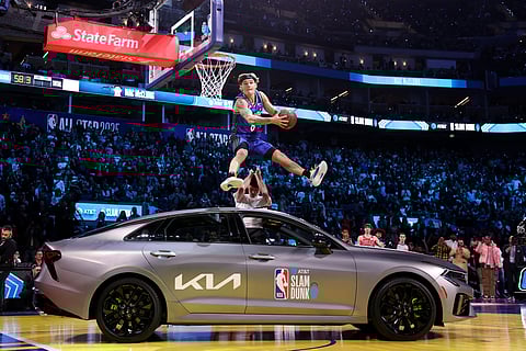 Mac McClung jumps over a car to win his third straight Slam Dunk title during the NBA All-Star Saturday at the Chase Center in San Francisco. 