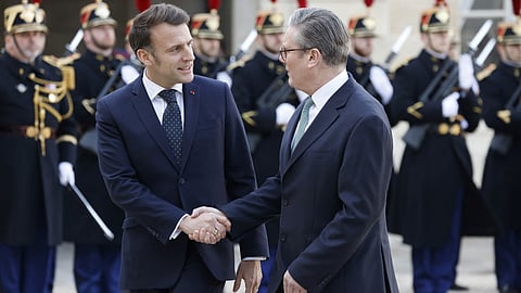 France's President Emmanuel Macron welcomes Britain's Prime Minister Keir Starmer before an informal summit of European leaders to discuss the situation in Ukraine and European security at The Elysee Presidential Palace in Paris on 17 February 2025. European leaders were due to meet in Paris on 17 February 2025 to address Washington's shock policy shift on the war in Ukraine, as Britain declared itself ready to dispatch peacekeeping troops to Ukraine.