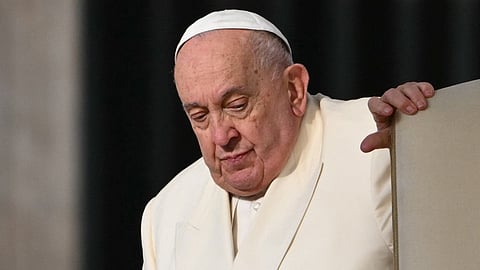 Pope Francis arrives for the weekly general audience at St Peter's Square in The Vatican on 13 November 2024. Pope Francis, who has been diagnosed with pneumonia in both lungs, passed a "peaceful night" at the Gemelli hospital, the Vatican said on 19 February 2025, amid growing concerns over the 88-year-old's condition.