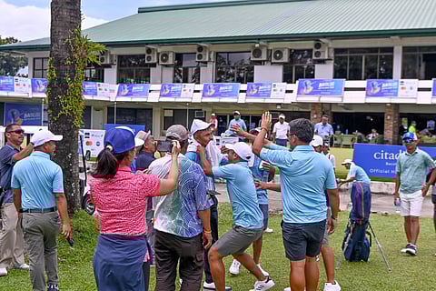 (File) Members of Eastridge-Prime Homes celebrate after posting a 21-point win over Manila Southwoods in the 76th PAL Interclub championships at Negros Occidental Golf and Country Club in Bacolod City on Friday.