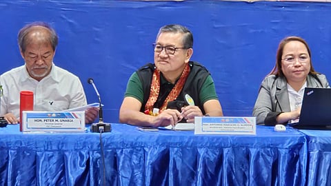 ENERGY and local government officials headed by National Electrification Administration Administrator Antonio Mariano Almeda (center) and Misamis Oriental Governor Peter Unabia  (left) grace the Power Consumers’ Forum, Friday, 21 February, at Arturo Lugod Memorial Sports and Cultural Center, Gingoog City. 