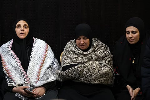 Palestinian families react after Israel delayed the release of Palestinian prisoners, scheduled to be released in the seventh hostage-prisoner exchange, in the occupied West Bank city of Ramallah early on February 23, 2025.