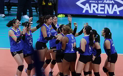 The Ateneo women’s squad whoops it up after posting a 25-18, 25-22, 25-18 win over UP in the UAAP Season 87 volleyball tournament on Sunday at the Mall of Asia Arena.
