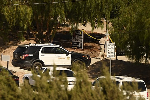 [FILES] A Los Angeles County Sheriff department vehicle is seen near police tape outside LA County Fire Station 81.