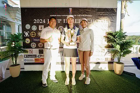 Julianna Ong is flanked by father Jasper and JGFP director Mariel Macasaet.