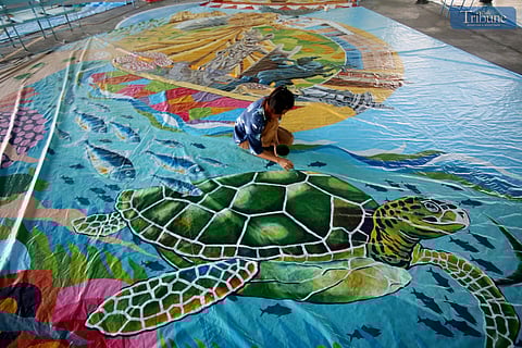 On Saturday, 1 March 2025, artists put the finishing touches on the sails of their boats, or pinta layag, for the 52nd Iloilo-Guimaras Paraw Regatta Festival in Iloilo City, set to take place on Sunday, 2 March 2025. The festival, held annually in the Arevalo district, features a sailboat race in the Iloilo Strait showcasing the paraw, a Visayan double-outrigger sailboat. Recognized as the oldest traditional craft event in Asia and the largest sailing event in the Philippines, the Paraw Regatta is a highlight of Iloilo City's tourism calendar.