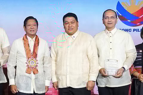 Toyota Motor Philippines is honored during the Bureau of Customs’ 123rd founding anniversary celebration. Shown are: (from left) President Ferdinand Marcos Jr.; Bienvenido Y. Rubio, BoC commissioner; and Dennis Ben-Hur Escuro, Toyota Motor Philippines first vice president for Comptrollership.