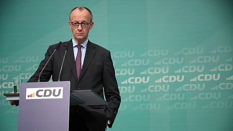 CDU leader and top candidate for chancellor Friedrich Merz looks on as CDU's top candidate for the Hamburg state elections Dennis Thering (not pictured) addresses a press conference after a CDU leadership meeting at the Konrad Adenauer Haus, headquarters of Germany's conservative Christian Democratic Union, in Berlin on 3 March 2025.