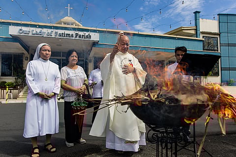 Rev. Fr. Jerry Habunal burns dried palm fronds outside Our Lady of Fatima Parish Church in Las Piñas City on the eve of Ash Wednesday, 4 March 2025.

Ash Wednesday marks the start of Lent, a season of penance, reflection, and fasting in preparation for Christ’s resurrection on Easter Sunday.