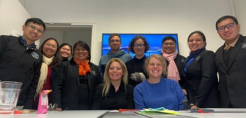 The UST team including assistant dean Mojica (fourth from left) with Dr. Kirsten Schraeyen (seated, left), Dr. Dorien Vandenborre (standing, sixth from left), Dr. Nele De Witte (seated, right), and Dr. Tom Van Daele (standing, fifth from left) 
