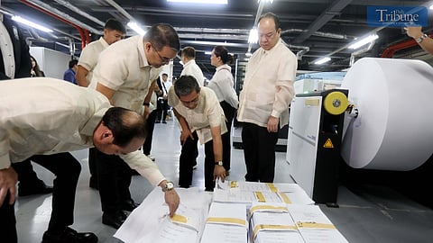 Comelec Chairman George Erwin Garcia, NPO Director Revsee Escobedo, and Comelec Commissioners Ernesto Maceda Jr. and Rey Bulay inspected the printing machines and official ballots from MIRU Systems and NPO on Monday, 27 January 2025, at the National Printing Office in Quezon City. The printing of ballots for the 2025 National and Local Elections, delayed by last-minute adjustments and candidate withdrawals, is now expected to be completed on 14 April.