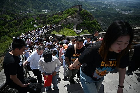 [FILES] A hashtag translating to ‘Japanese man and woman detained for indecent behavior at the Great Wall’ had been viewed over 60 million times on social media platform Weibo.