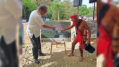 SBMA chairman and administrator Eduardo Jose L. Aliño, along with Tatay Kasoy Liwanag of the Tribong Ayta Pastolan, points to the concept art of the P1.1-billion dormitory complex that will be constructed in the Subic Bay Freeport Zone.