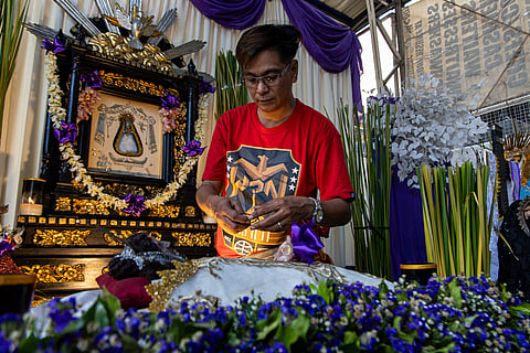 Collector Richie Canlas cleans the image of Nuestra Señora de la Soledad de Manila ahead of the 2025 Lenten Exhibit in Tondo, Manila on Tuesday, 25 March 2025.

Canlas, who is also the official florist of the Minor Basilica and National Shrine of Jesus Nazareno in Quiapo, will showcase 25 saint images he has collected over the past 12 years from various cities.
