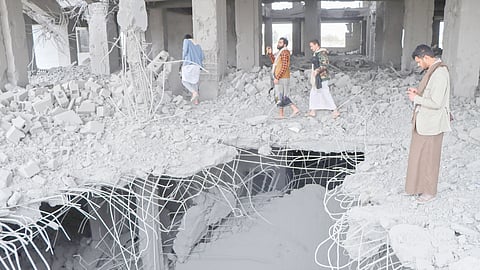 Yemenis inspect the damage in the Al-Rasul Al-Aadham cancer and oncology hospital’s unfinished building, a day after it was hit in a US strike in Yemen’s northern Saada province on 25 March 2025. 
