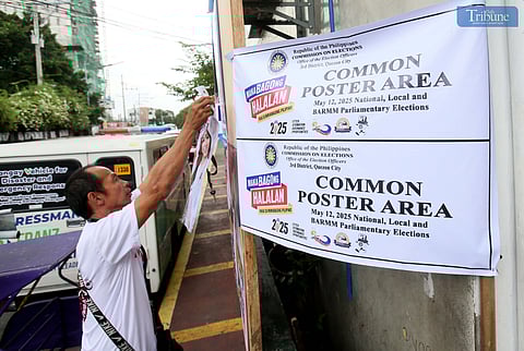 (March 29 2025) On Saturday March 29 2025, a candidate supporter put a campaign tarpaulin at the designated common poster area in the different Barangays in Quezon City. Comelec chairman Garcia reminded campaign teams of candidates to be respectful in conducting their campaign activities, particularly in placing posters and tarpaulins properly. Photo/Analy Labor