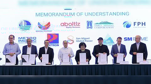 First Philippine Holdings chairperson Federico Lopez (third from left) joins other top business leaders in signing with Environment Secretary Maria Antonia Yulo Loyzaga (fifth from left) a memorandum of understanding in support of government’s program to plant 10 million trees over the next three years.