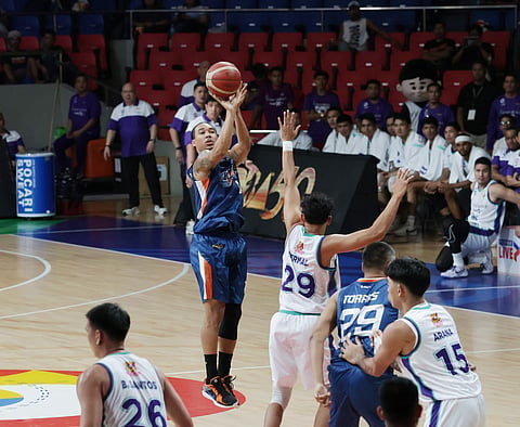 Chris Newsome rescues defending champion Meralco with a game-winning jumper to beat Converge, 91-89, in the PBA Philippine Cup opener Friday at the Ninoy Aquino Stadium.