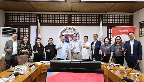 Officials from Aboitiz Foundation and DepEd formalize a partnership to electrify classrooms and bridge the digital divide through Aurora PH. Partners from DFNN Inc. and Huawei Technologies Philippines witnessed the signing of the memorandum of agreement